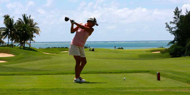 Woman playing Golf